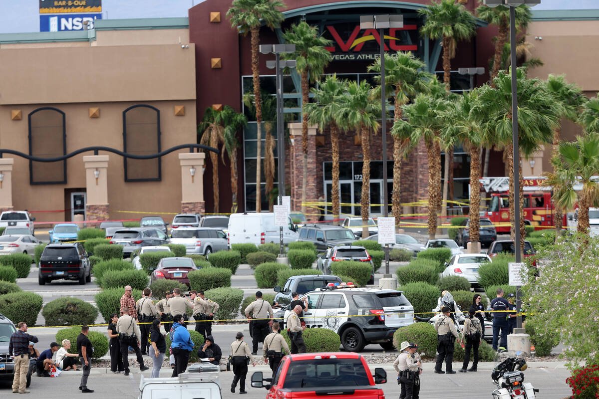 Las Vegas police investigate following an officer involved shooting that left a suspect dead at Las Vegas Athletic Club